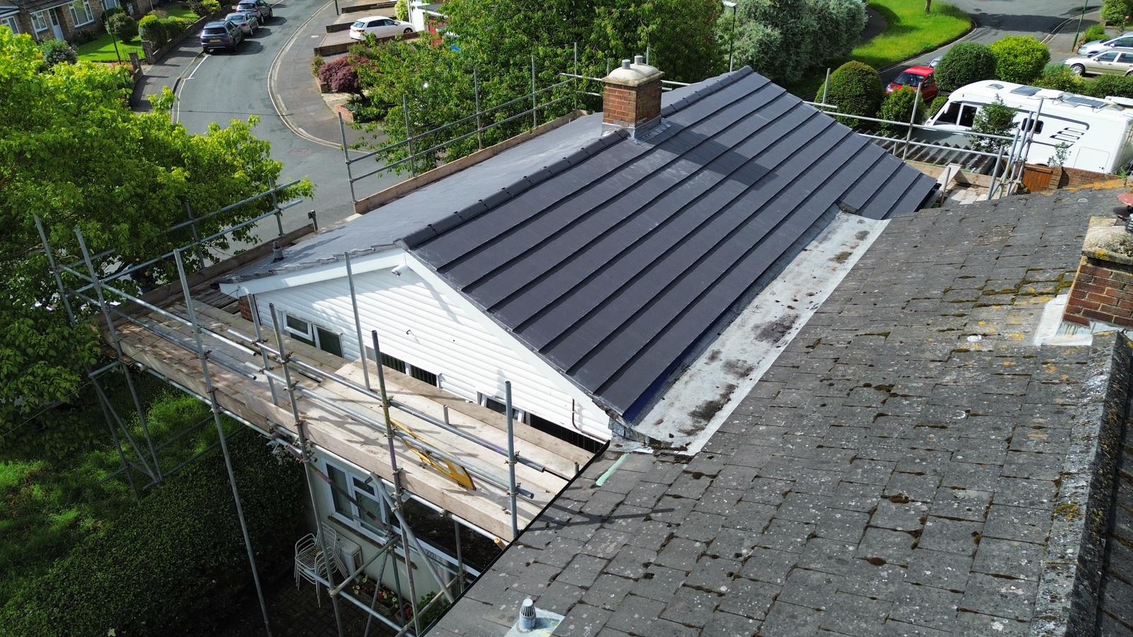 Newly tiled extension roof completed by RNH Building Solutions, viewed from above